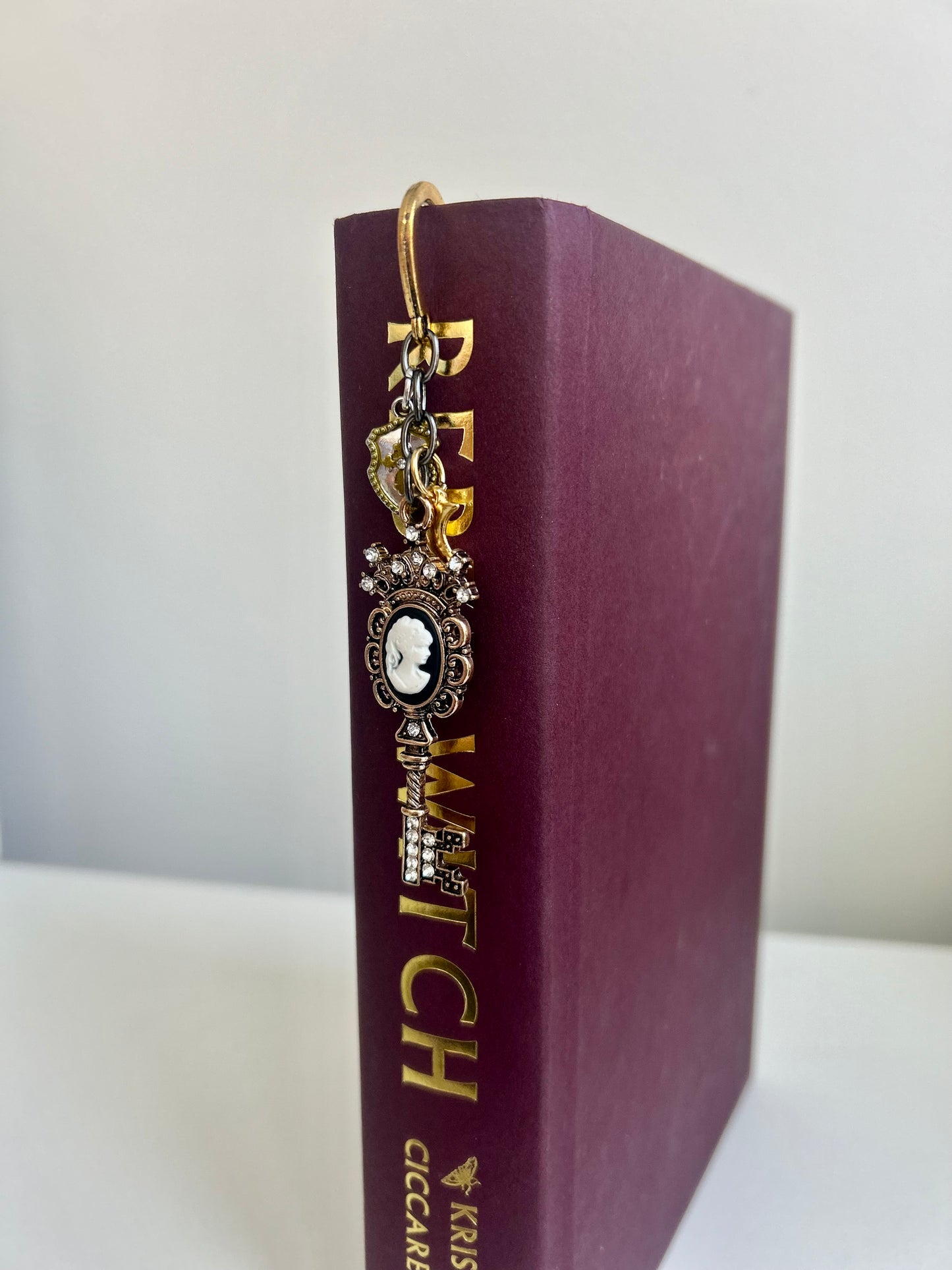 Moonshadow Key ā Cameo Key Charm Bookmark
