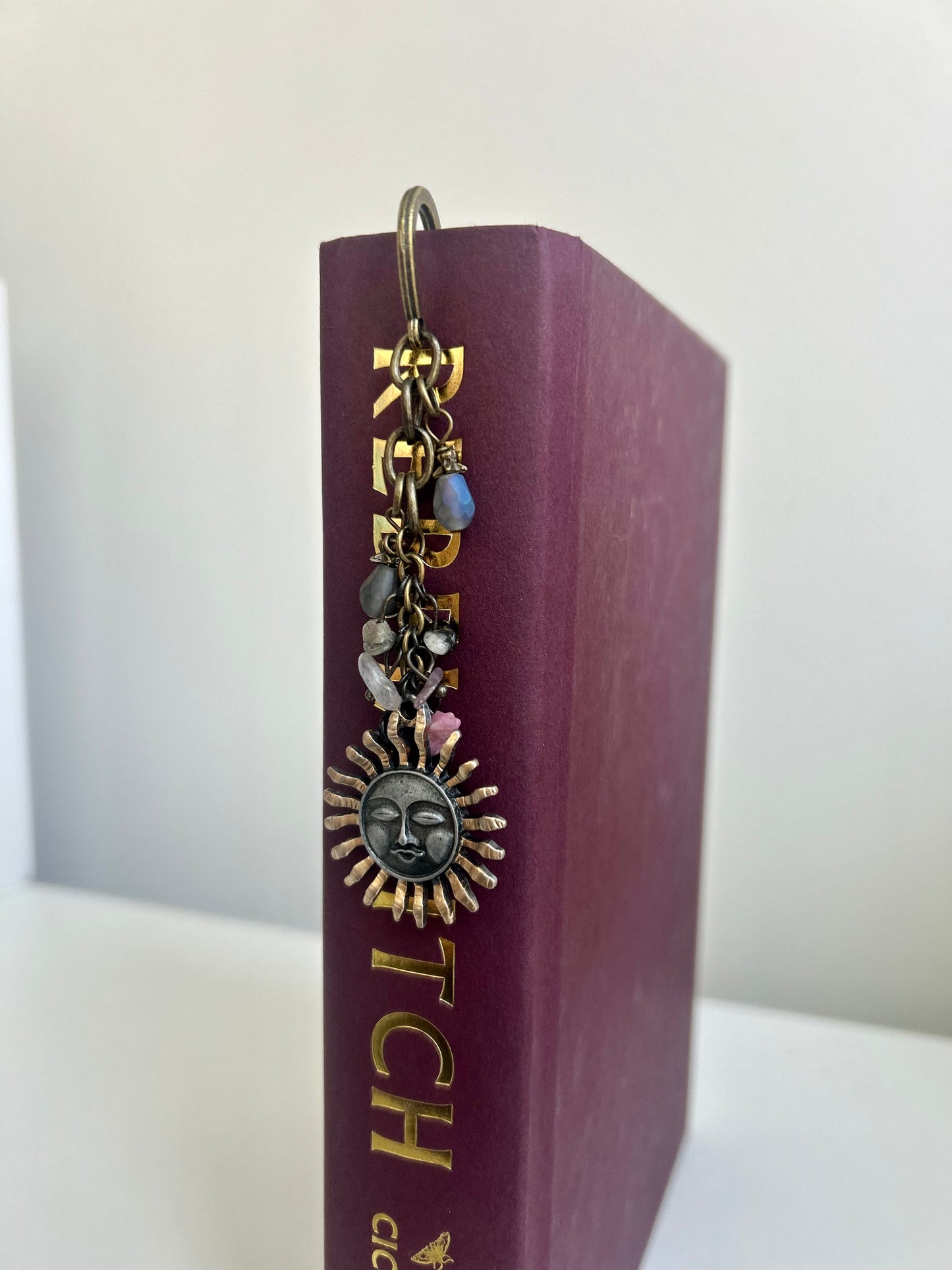 Sunchaser’s Talisman – Sun Medallion Charm Bookmark