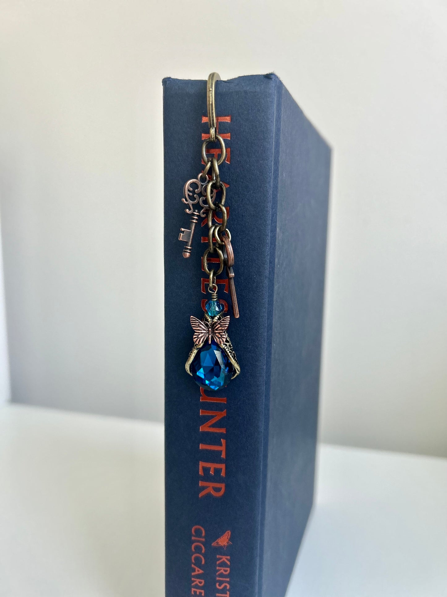 Butterfly’s Secret – Crystal & Keys Charm Bookmark
