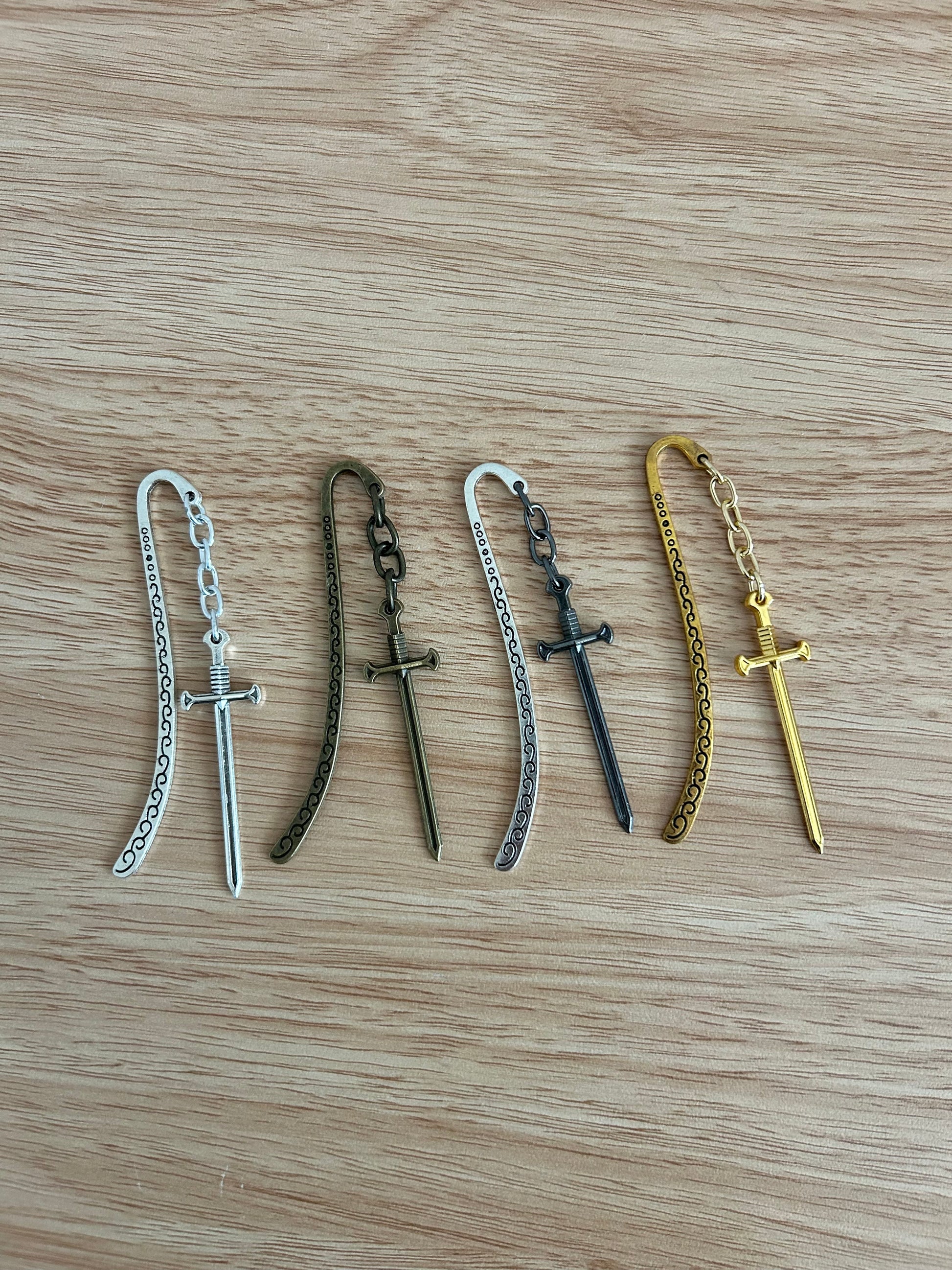 Bladewarden – Sword Charm Bookmark-1